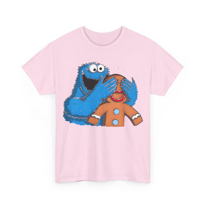 Front view of Cookie Monster guess who Graphic Unisex Tee Shirt in pink, featuring a playful illustration of Cookie Monster with a gingerbread man, perfect for adding a touch of whimsy to any ensemble.