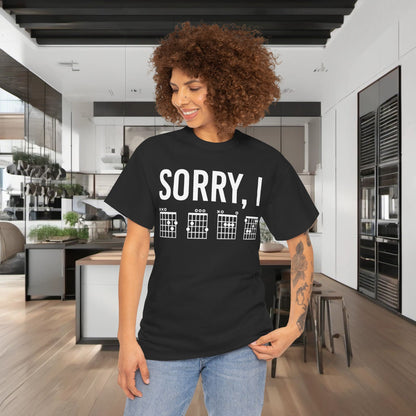 Experience luxury fashion with the Sorry I DGAF Graphic T-Shirt, showcased on a model in a sleek kitchen environment, highlighting its stylish and unisex design.