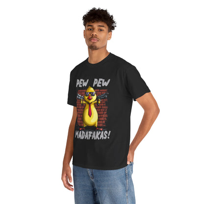 Stylish model wearing a comedic gangster chicken t-shirt, featuring vibrant graphic design against a rustic brick wall backdrop.