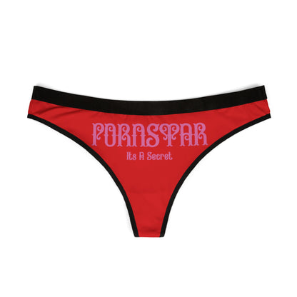 Elegant red thong panties for women showcasing the cheeky slogan 'PORNSTAR: It's A Secret' with a stylish black waistband, perfect for a blend of comfort and allure.