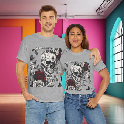 A stylish couple wearing the Skulls and Roses Cotton Tee, unisex graphic shirt, displaying the striking skull and rose artwork in a vibrant setting.