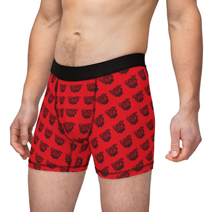 Model wearing Valentine's Naughty Cheeky Men's Boxer Briefs, showcasing the playful design in red with 'I LICKED IT SO IT'S MINE' lettering, ideal for romantic gifts.