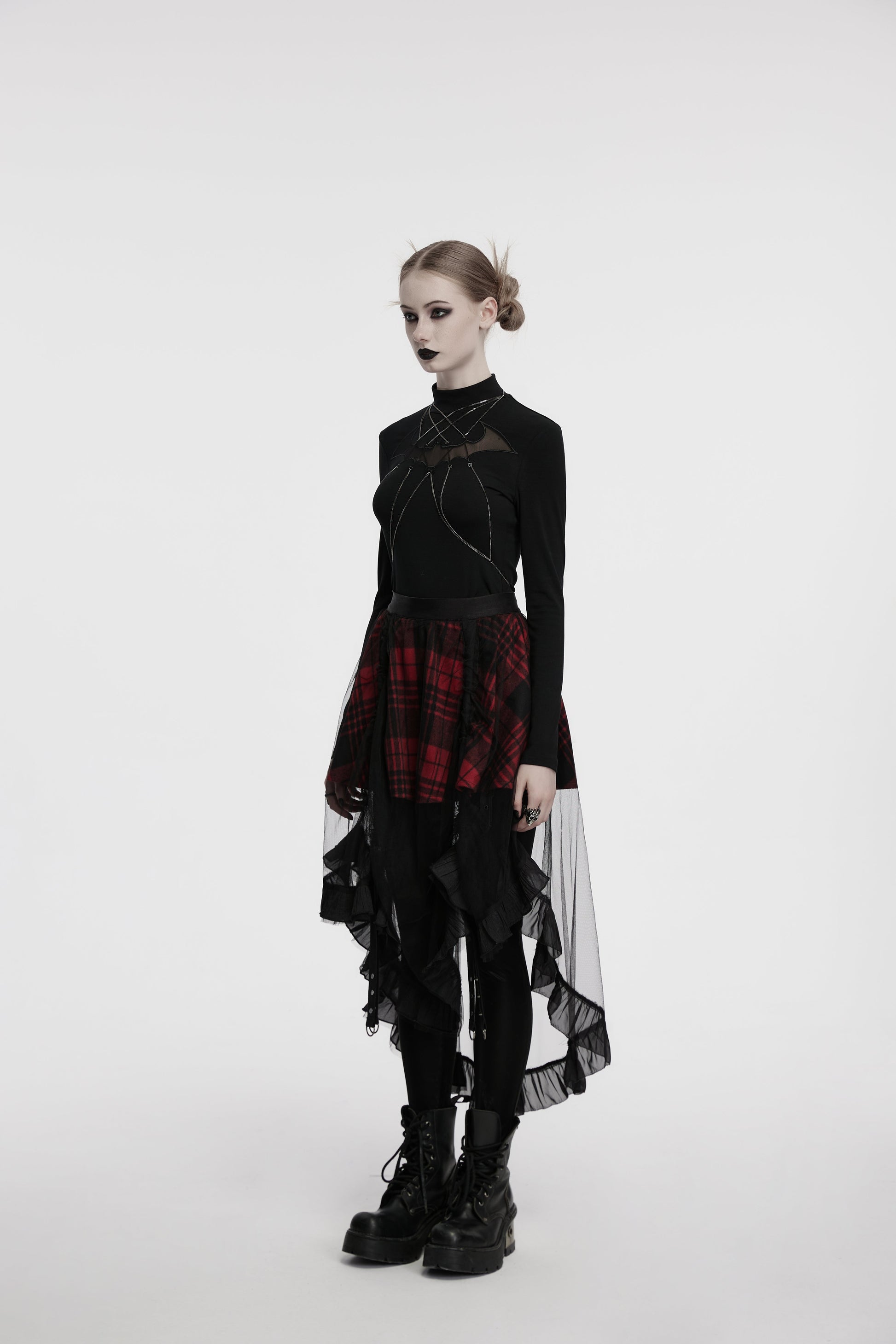 Side view of the Punk Rave Morrigan Skirt, highlighting the adjustable studded webbing straps and dramatic high-low silhouette, designed for versatile and bold styling in alternative fashion.