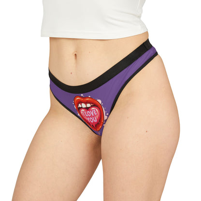 Stylish women's thong worn by a model, featuring a striking design of red lips with 'I love you' text, ideal for adding a touch of cheeky elegance to romantic attire.
