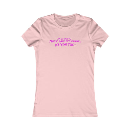Pink women's t-shirt showcasing a bold statement, 'IT'S OKAY, THEY ARE STARING AT YOU TOO!' in striking pink font, perfect for those who embrace their individuality with flair.