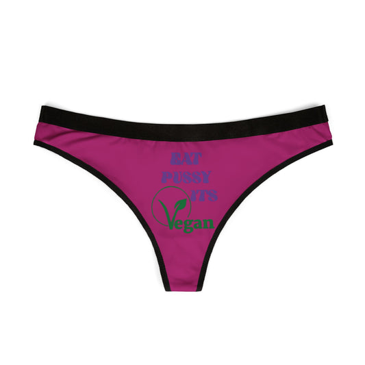 Front view of a high-quality vegan women's thong featuring the playful phrase 'Eat Pussy, It's Vegan' in bold purple and green colours, perfect for adding a touch of humour to any lingerie collection.