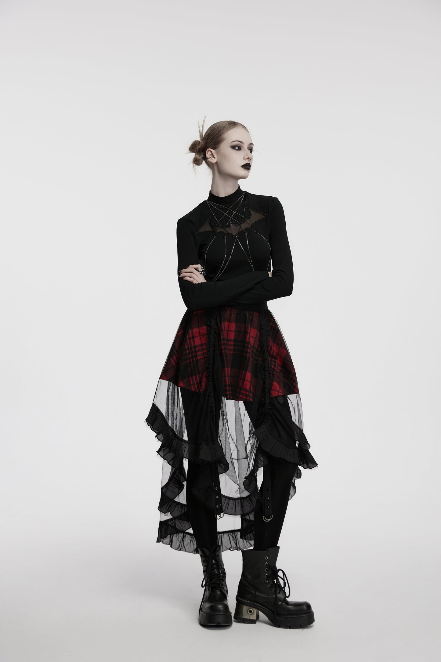 Full view of the Punk Rave Morrigan Mesh Plaid High-Low Skirt being worn, showcasing its captivating blend of red plaid and sheer mesh, perfect for making a striking fashion statement.