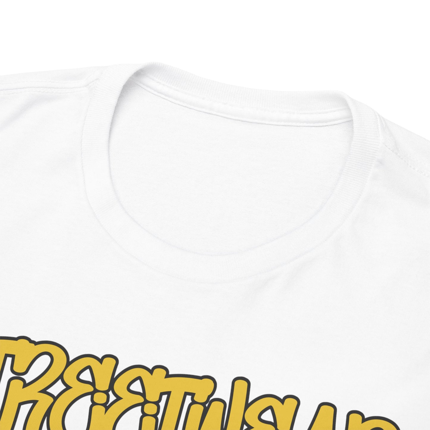 Close-up view of the neckline of a luxurious white t-shirt, featuring the whimsical yellow lettering of "STREETWEAR", emphasizing premium fabric and craftsmanship.