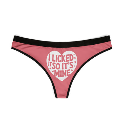 Valentine's Naughty Gift Cheeky Women's Thong featuring playful 'I Licked It So It’s Mine' design, elegant pink background with black trim.