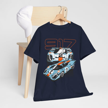 Dynamic Porsche 917 graphic t-shirt displayed elegantly on a wooden hanger, showcasing its iconic design with two race cars and the striking '917' logo.