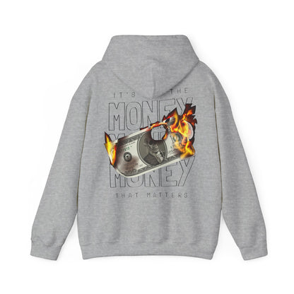 Stylish grey hoodie adorned with an eye-catching graphic on the back of a burning dollar bill, complemented by the statement "IT'S NOT THE MONEY, IT'S THE MONEY THAT MATTERS," embodying a luxe streetwear vibe.