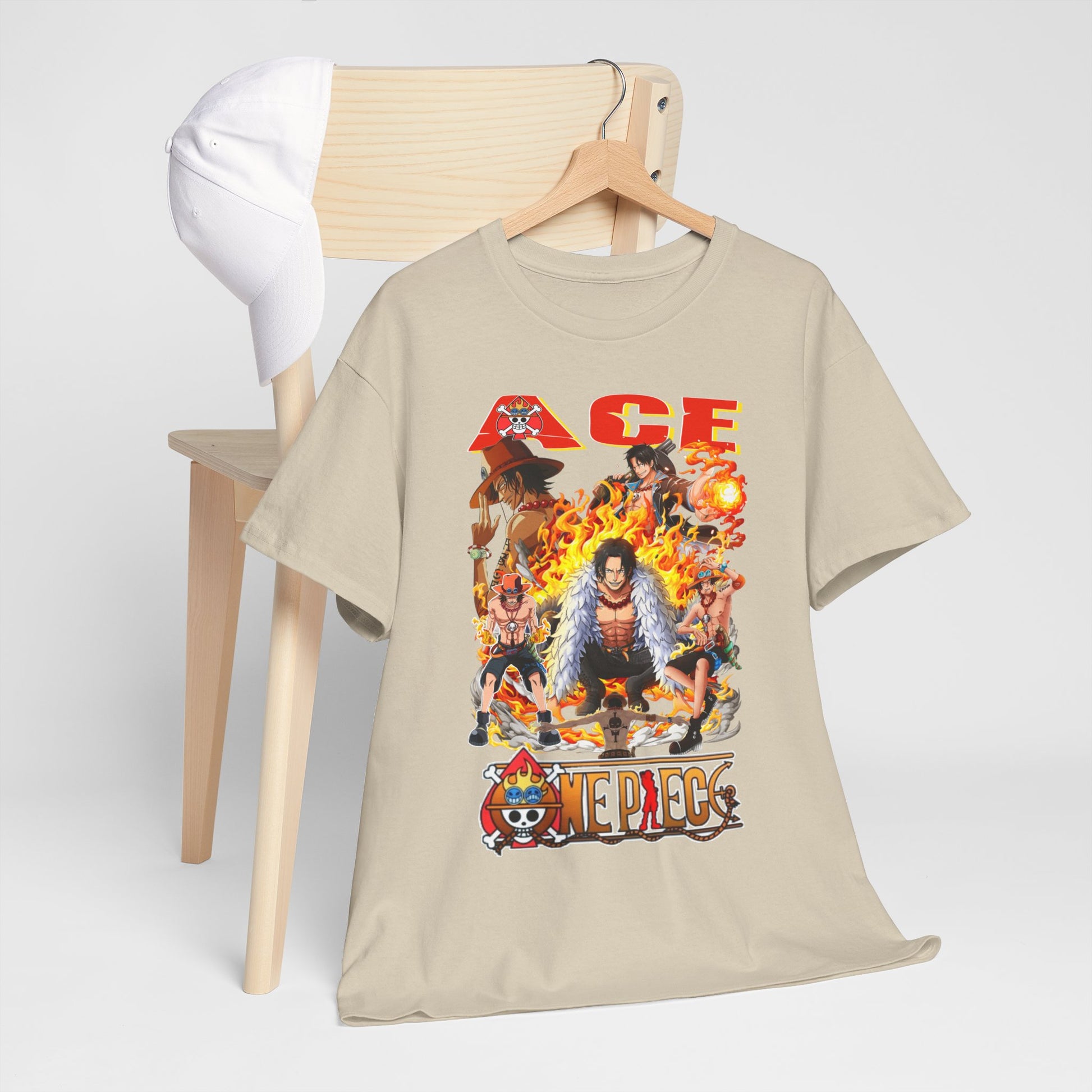 Luxurious one-piece t-shirt featuring a bold Ace graphic surrounded by flames, designed for anime enthusiasts, elegantly displayed on a wooden hanger with a coordinating cap.
