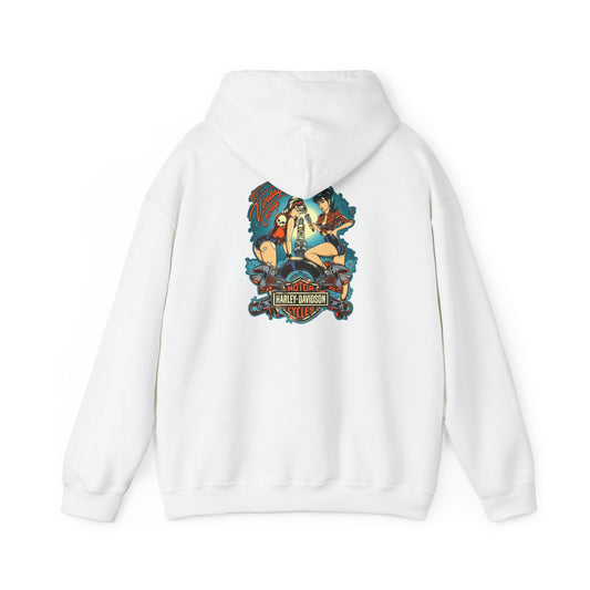 Elegant vintage garage hoodie featuring a striking back print of two pin-up women working on a motorcycle, exuding retro charm against a vibrant teal-blue background from Dazzling Dreams Studio.