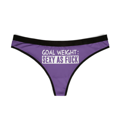 Chic women's thong showcasing a striking purple colour and provocative text 'Goal Weight: Sexy As Fuck', perfect for confident lingerie collection.