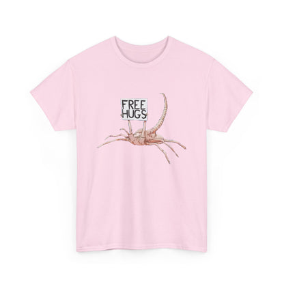 Charming front view of the Alien Xenomorph Facehugger Free Hugs unisex graphic cotton funny t-shirt, featuring a whimsical illustration of a facehugger with a playful 'Free Hugs' sign. Ideal for adding a touch of humour to any outfit.