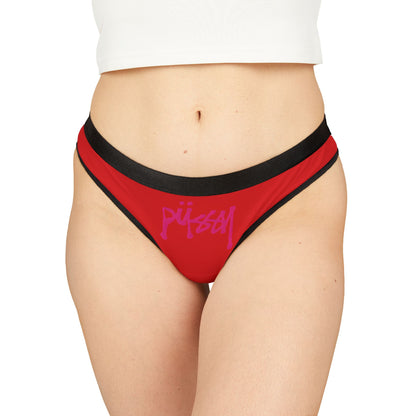Model wearing luxurious red thong panties with a trendy 'pussy' graphic, highlighting stylish lingerie that empowers feminine self-expression.