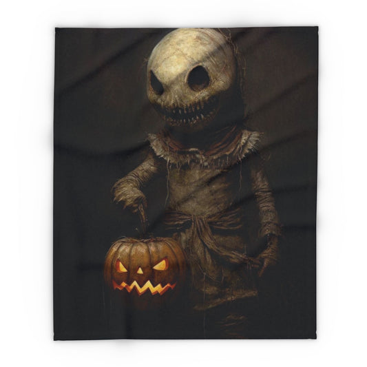 Luxurious Decorative and Warm Halloween Spooky Arctic Fleece Blanket showcasing a mythical character holding a jack-o'-lantern, perfect for autumn vibes.