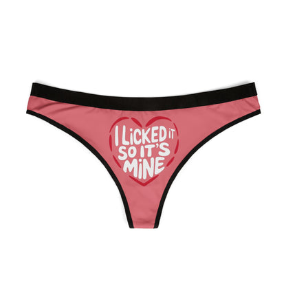 Luxurious Valentine's Naughty Gift: Cheeky Women's Thong with playful 'I Licked It So It’s Mine' graphic on a soft pink background, perfect for a romantic occasion.