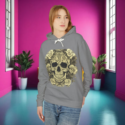 Model wearing the Skull and Roses Lightweight Hoodie in grey, presenting the striking skull and roses design in a chic and colourful interior.