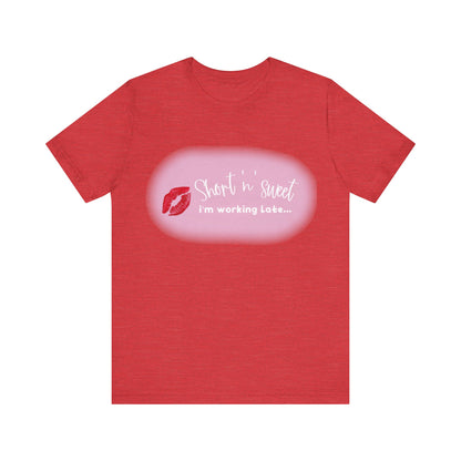 Sabrina Carpenter Inspired Unisex Short Sleeve Tee in a vibrant red blend with an eye-catching lipstick print, merging music inspiration with luxury fashion.