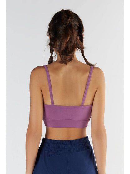 Detailed image of the minimalist design of a women's luxury bra top, featuring clean lines and seamless construction for a sleek look.