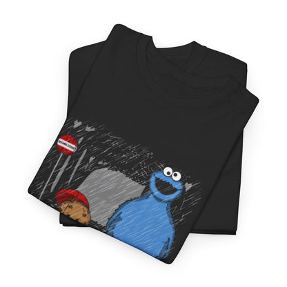 Chic stacked Cookie Monster Sesame Street graphic t-shirts showcasing a whimsical design of the blue character with a cookie under an umbrella, perfect for enjoying casual luxury.