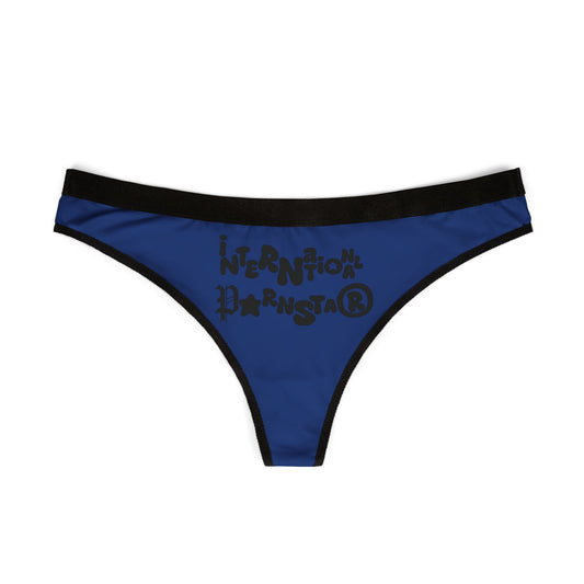 Elegant International Star women's thong in blue, prominently displaying whimsical text and fashionable black trim, perfect for embodying both fun and femininity.