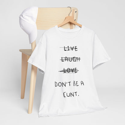 Live Laugh Love Funny Mens Womens Graphic T-Shirt displayed artistically with a cap, highlighting its versatility for a chic casual look.