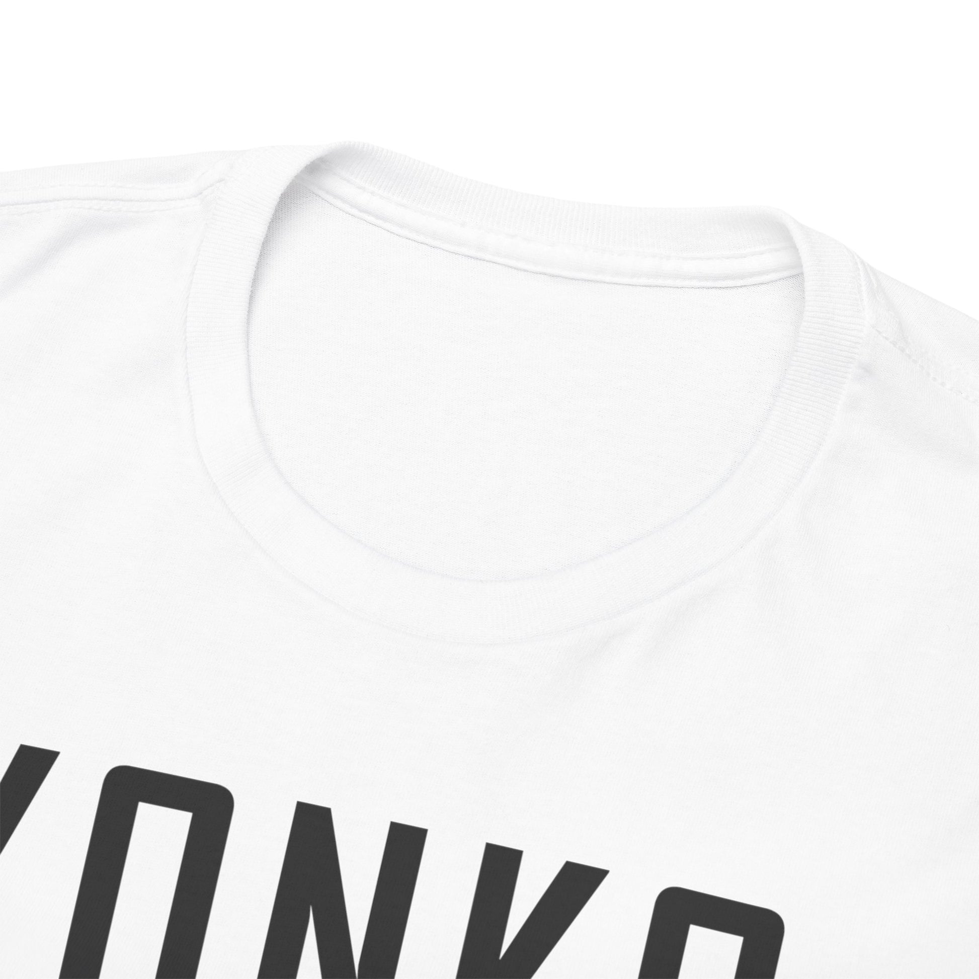 Close-up detail of a YONKO t-shirt's neckline, emphasising soft, high-quality craftsmanship, designed for comfort and style in anime-inspired fashion.