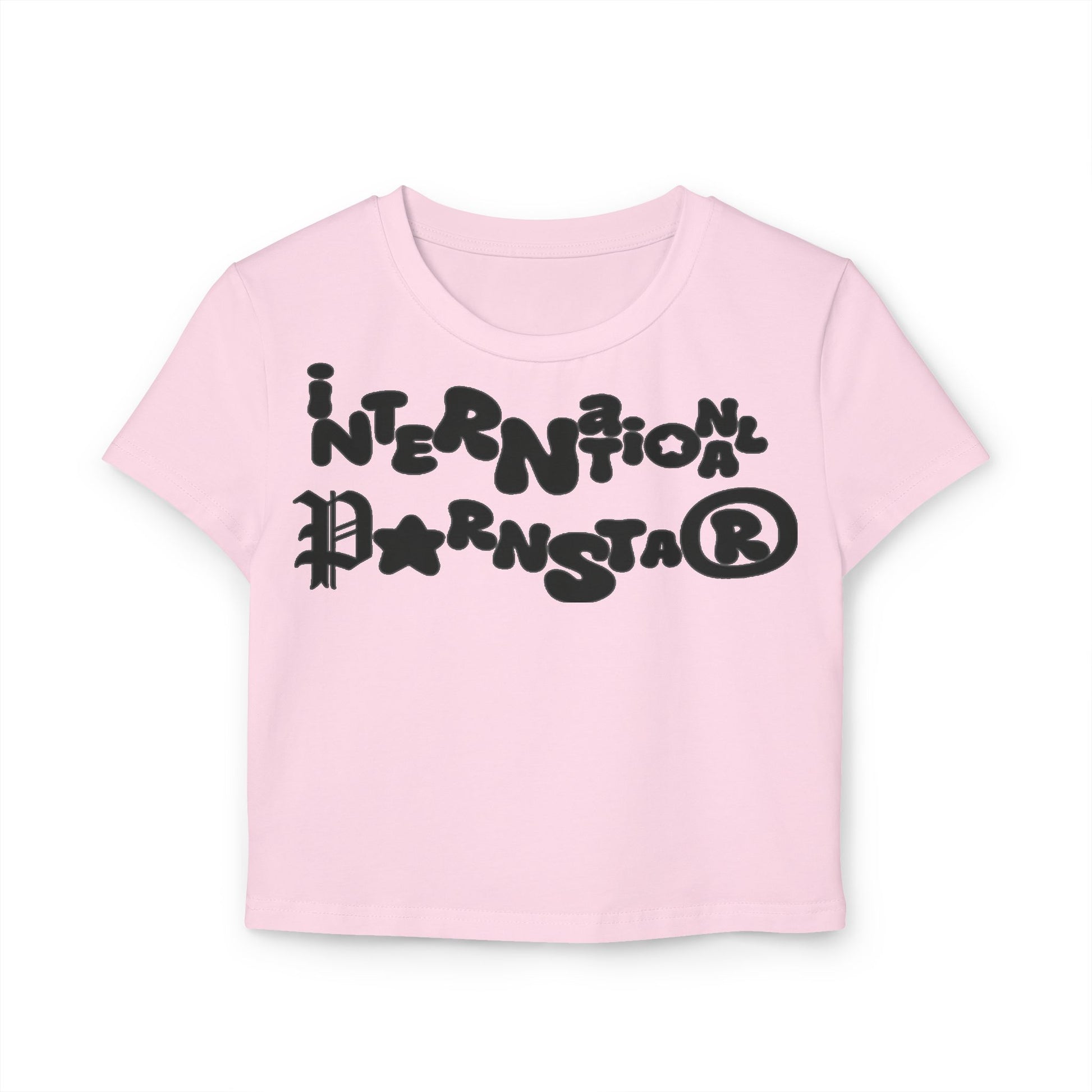 Front view of a luxury women's cropped baby t-shirt in soft pink, featuring a vibrant graphic design with the words 'International Parnstar', ideal for stylish and playful casual wear.
