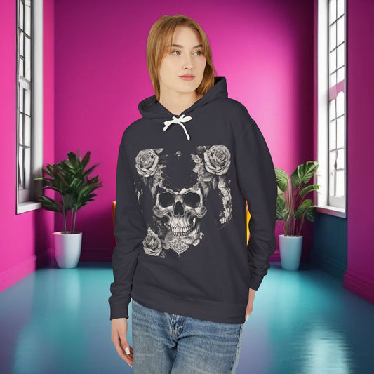 Unisex Lightweight Hooded Sweatshirt with a striking designer skull and roses design, worn by a model in a stylish dark shade, set in an elegant room with bright pink walls, exemplifying luxury street fashion.