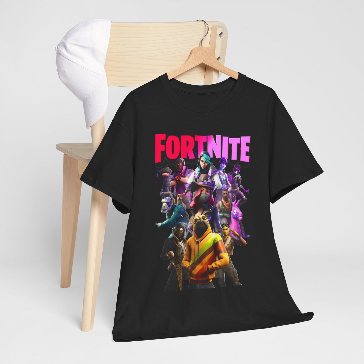 Chic Fortnite T-shirt showcased on a sleek wooden chair with a cap, highlighting bold character designs for modern gamers.