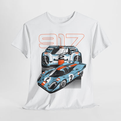 Luxurious white graphic t-shirt featuring an exquisite illustration of two iconic Porsche 917 race cars with light-blue designs and vibrant orange racing stripes, perfect for car enthusiasts.
