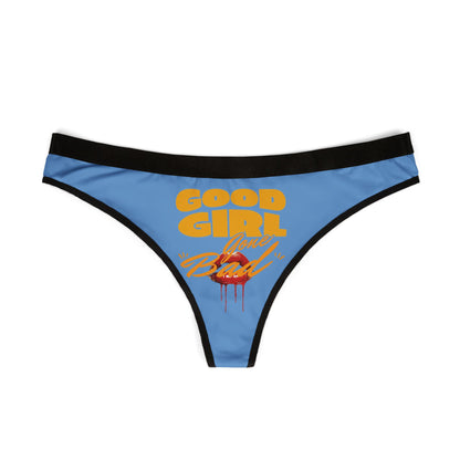 Elegant blue thong panties with prominent 'Good Girl Gone Bad' print, accented with striking yellow and orange hues, perfect for confident women seeking a bold fashion statement.