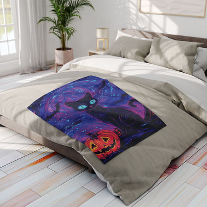 Chic Decorative and Warm Halloween Spooky Arctic Fleece Blanket artfully placed on a bed, featuring a captivating design of a black cat and pumpkin against a starry background, enhancing the elegance of seasonal décor.