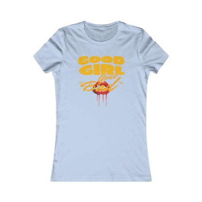 Luxurious light blue women’s t-shirt featuring the bold phrase 'Good Girl Gone Bad' in eye-catching yellow letters, complemented by a graphic of seductive red lips with dripping accents.