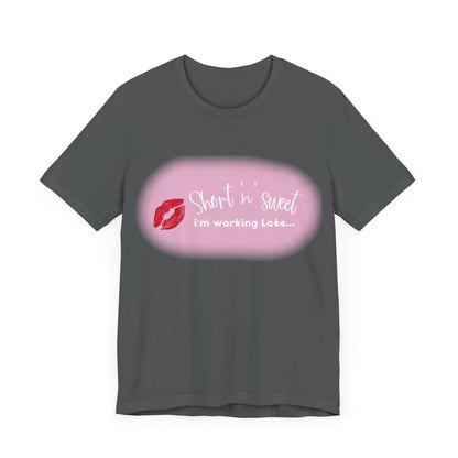 Sabrina Carpenter Inspired Unisex Short Sleeve Tee in sophisticated grey with vibrant lipstick print, ideal for fashion-forward individuals.