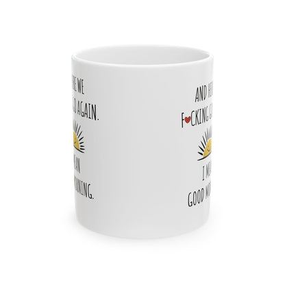 Another angle of the Here We Go Again Funny Novelty Mug displaying the playful text 'AND HERE WE F*Cking GO AGAIN. I MEAN GOOD MORNING.' A delightful addition to elevate your coffee experience.
