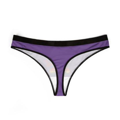 Luxurious purple women's thong showcasing a sleek design with a playful inner graphic, perfect for adding a cheeky touch to intimate wear.