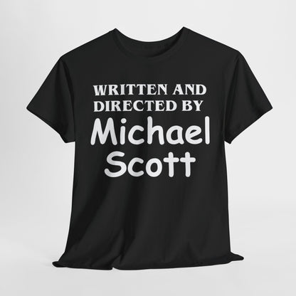 The Office Unisex Men Women Graphic Funny T Shirt Tee Urban featuring the phrase 'WRITTEN AND DIRECTED BY MICHAEL SCOTT' prominently displayed in bold letters on a sleek black fabric, embodying a blend of humour and nostalgia.
