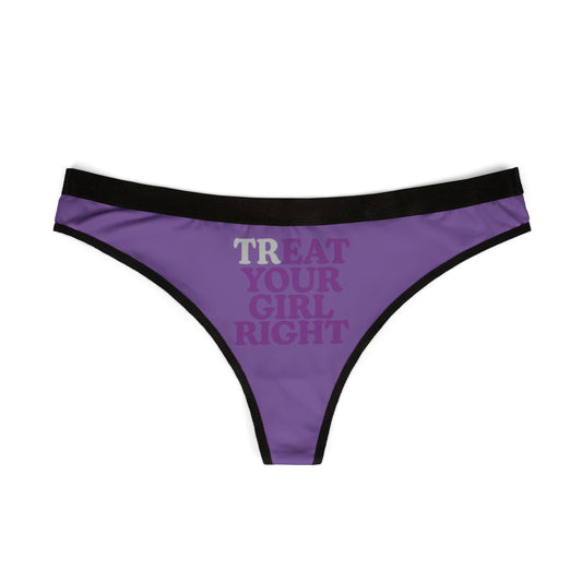 Front view of a chic women's thong in vibrant purple with contrasting black trim, showcasing the stylish slogan 'TREAT YOUR GIRL RIGHT'.