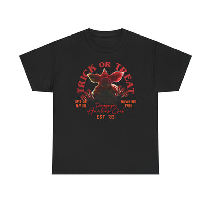 Sophisticated black unisex t-shirt adorned with an eye-catching Demogorgon illustration and bold 'TRICK OR TREAT' slogan, perfect for fans of the cult classic series, enhancing casual attire with a touch of luxe.