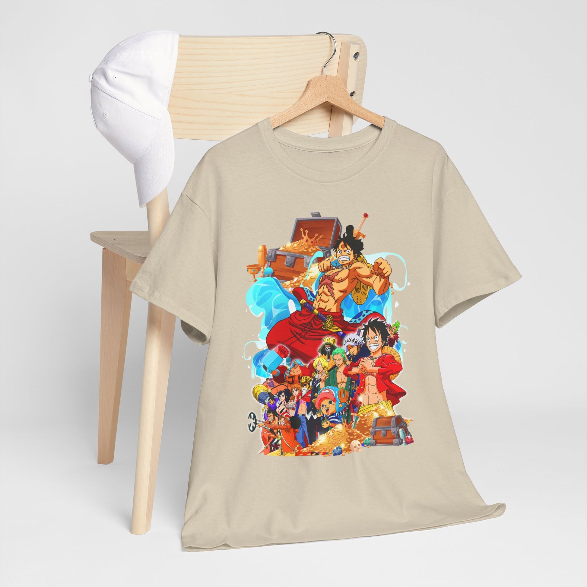 Trendy beige t-shirt elegantly displayed on a wooden chair, showcasing a colourful One Piece anime design that captures the spirit of adventure.