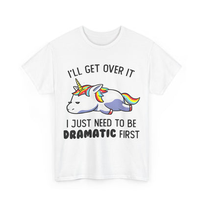 Unicorn Melancholy Graphic Tee in white, adorned with a playful illustration of a cartoon unicorn and the phrases 'I’LL GET OVER IT' and 'I JUST NEED TO BE DRAMATIC FIRST'.