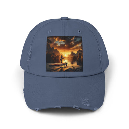 Unisex Distressed Paddleboarders Cap showcasing a scenic sunset paddleboarding graphic, perfect for stylish sun protection for adventurous water lovers.