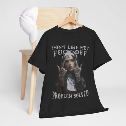 Chic black t-shirt draped on a chair, adorned with a bold tattooed nun illustration and the text 'DON'T LIKE ME? F*** OFF PROBLEM SOLVED'. A unique piece for those who embrace individuality.