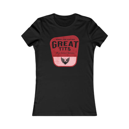 Luxury women's graphic t-shirt featuring a bold and humorous design with the phrase 'Sorry for having GREAT TITS' in vintage-style lettering on a deep red background, ideal for confident and empowered self-expression.