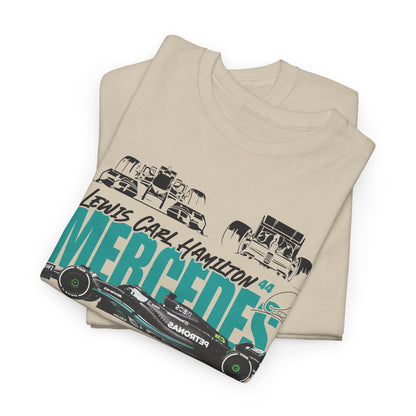 Stacked luxury beige t-shirts showcasing vibrant prints of a Mercedes F1 car and iconic text, ideal for motorsport enthusiasts and fashion aficionados.