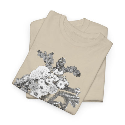 Stacked floral heart graphic t-shirts, showcasing intricate floral designs merging with anatomical art in a sophisticated beige colour.