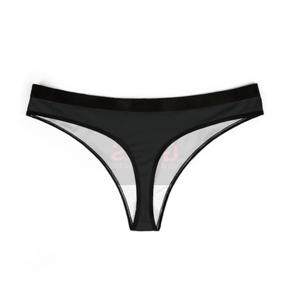 Sophisticated black women's thong showcasing bold pink text 'Good Girls Need Spanking Too', perfect for a playful yet luxurious lingerie collection.